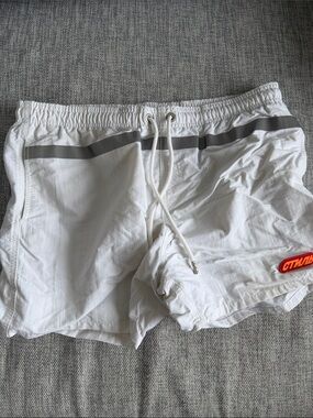 Heron Preston White Swim Shorts with Reflective Stripe and Red Patch